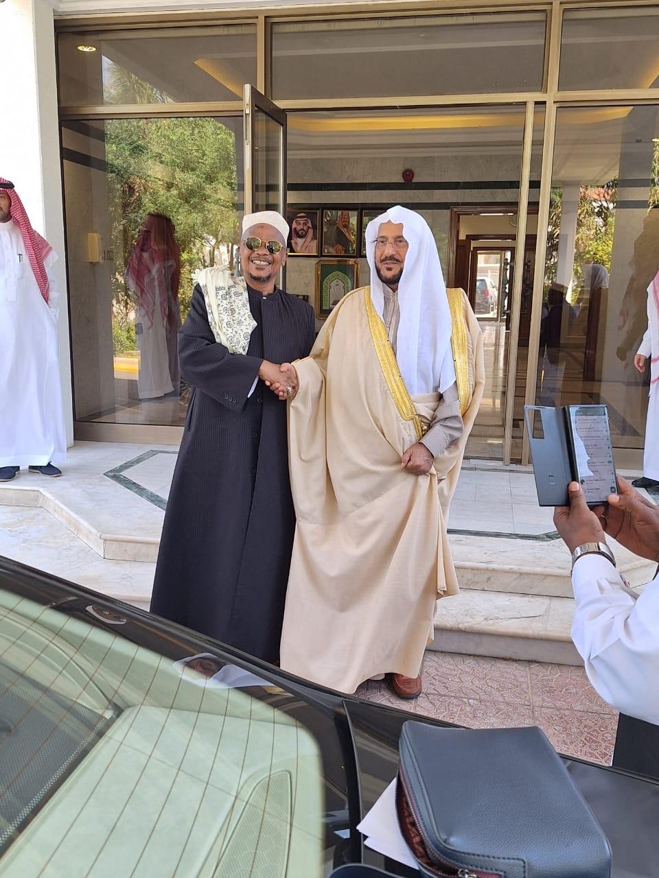 A diverse team of professionals collaborating in a modern office environment